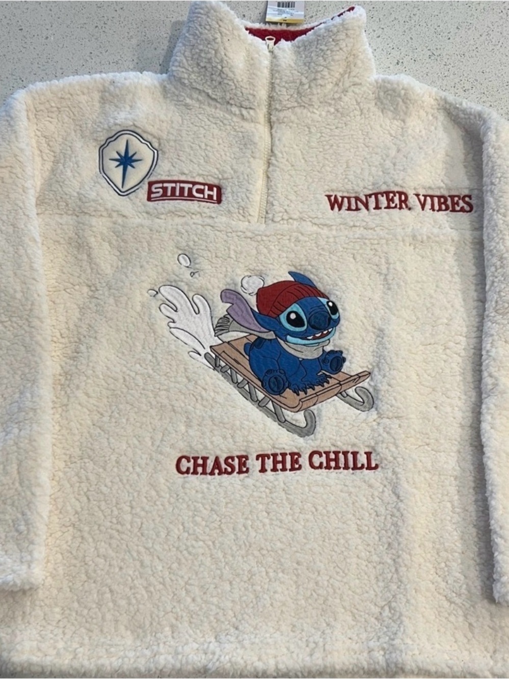 Disney Cream Fleece Pullover with Blue Stitch and Red Accents